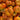 Pile of orange-red flat nectarines